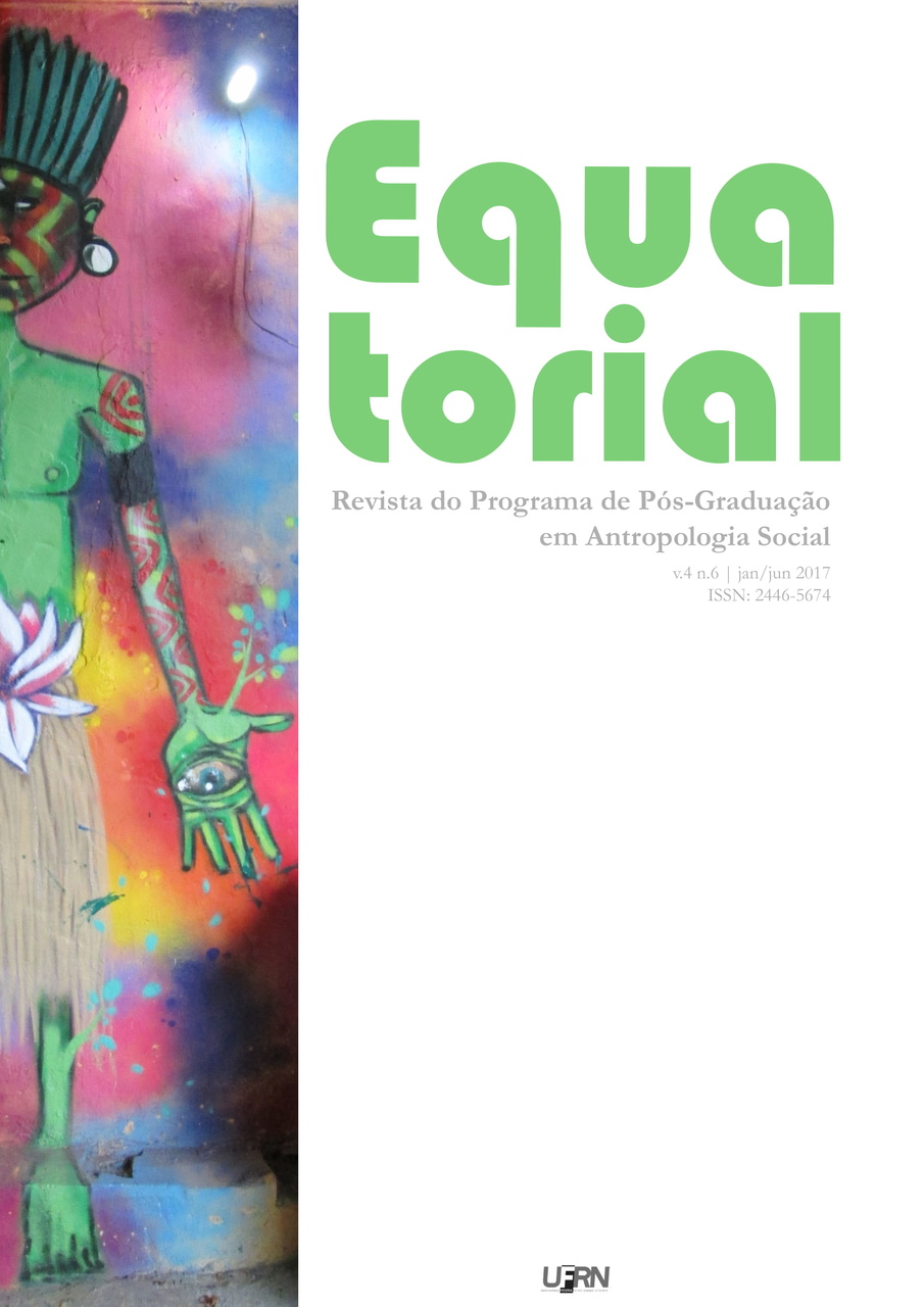 Capa com figura indígena em grafite sob parede fotografada por Gabrielle Dal Molin